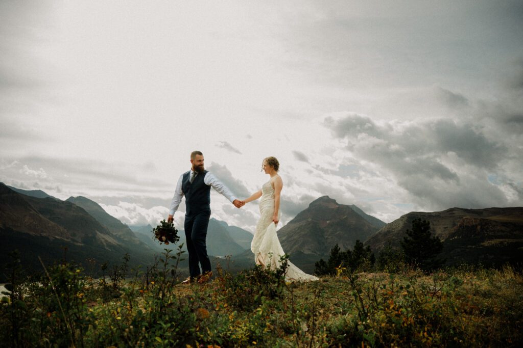 You know it's an adventure wedding in Glacier National Park when you see bears, stumble across mountain sheep and get married! The bride said this about her wedding day, "we literally did EVERYTHING!" 

A Two Medicine wedding ceremony and then a drive up the Going to the Sun Road made this day an epic adventure!