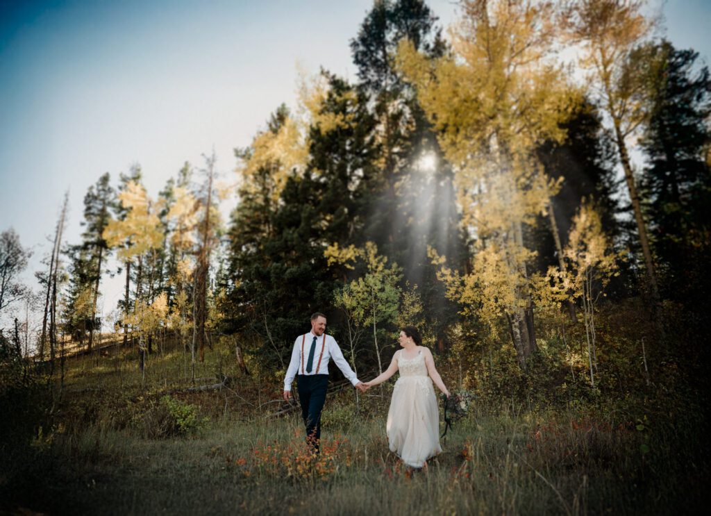 A stunning Yellowstone National Park elopement with intimate moments, breathtaking views and of course the perfect wedding guests- BUFFALO!

Gorgeous wedding photos at sunset in Yellowstone National Park.