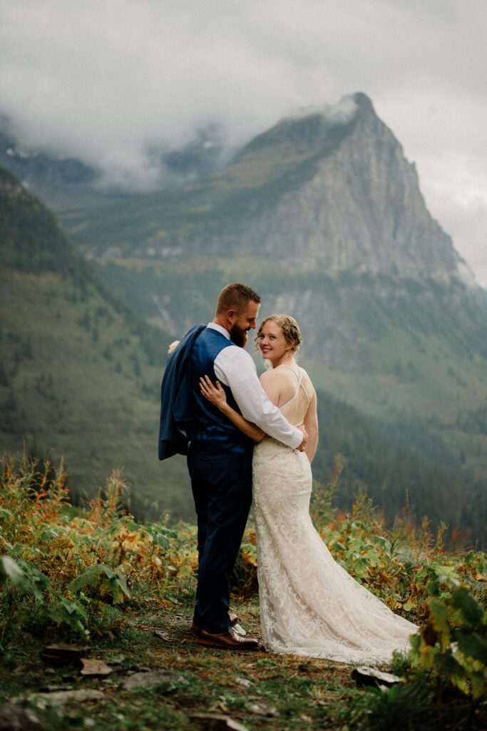 You know it's an adventure wedding in Glacier National Park when you see bears, stumble across mountain sheep and get married! The bride said this about her wedding day, "we literally did EVERYTHING!" 

A Two Medicine wedding ceremony and then a drive up the Going to the Sun Road made this day an epic adventure!