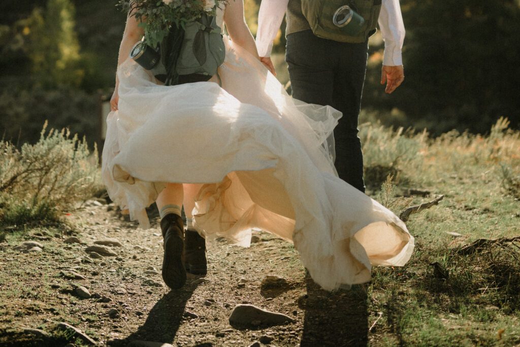 A stunning Yellowstone National Park elopement with intimate moments, breathtaking views and of course the perfect wedding guests- BUFFALO!

Gorgeous wedding photos at sunset in Yellowstone National Park.