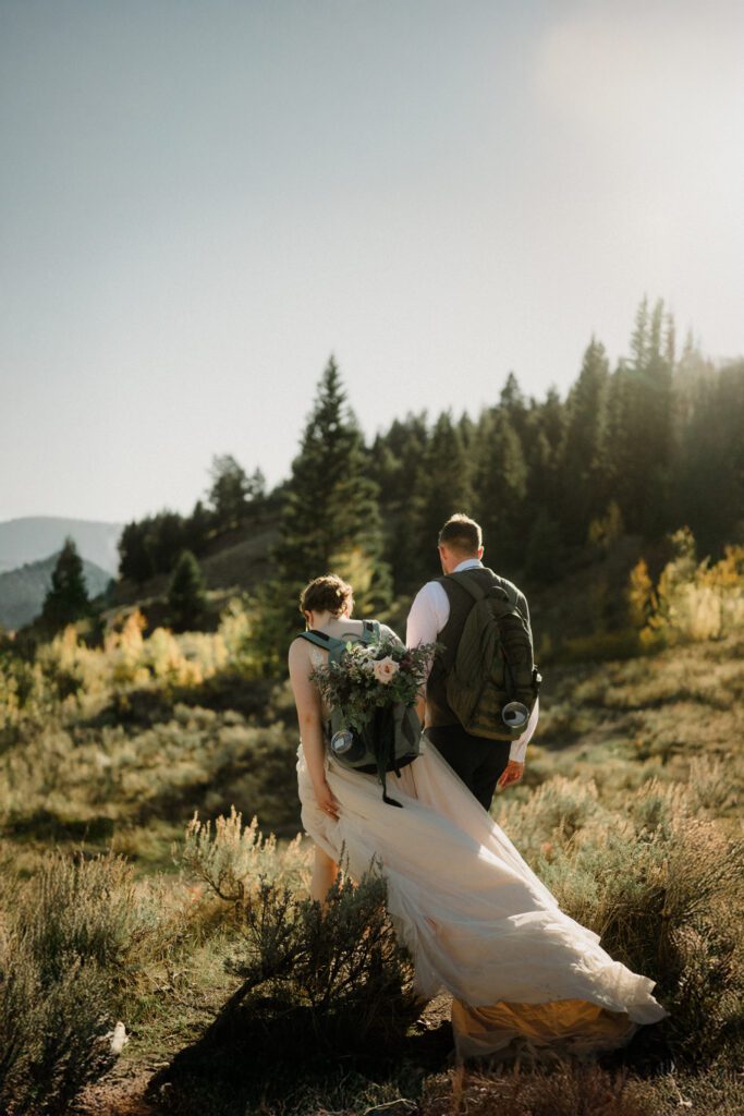 A stunning Yellowstone National Park elopement with intimate moments, breathtaking views and of course the perfect wedding guests- BUFFALO!

Gorgeous wedding photos at sunset in Yellowstone National Park.