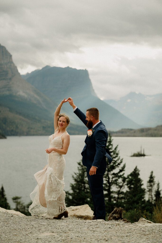 You know it's an adventure wedding in Glacier National Park when you see bears, stumble across mountain sheep and get married! The bride said this about her wedding day, "we literally did EVERYTHING!" 

A Two Medicine wedding ceremony and then a drive up the Going to the Sun Road made this day an epic adventure!