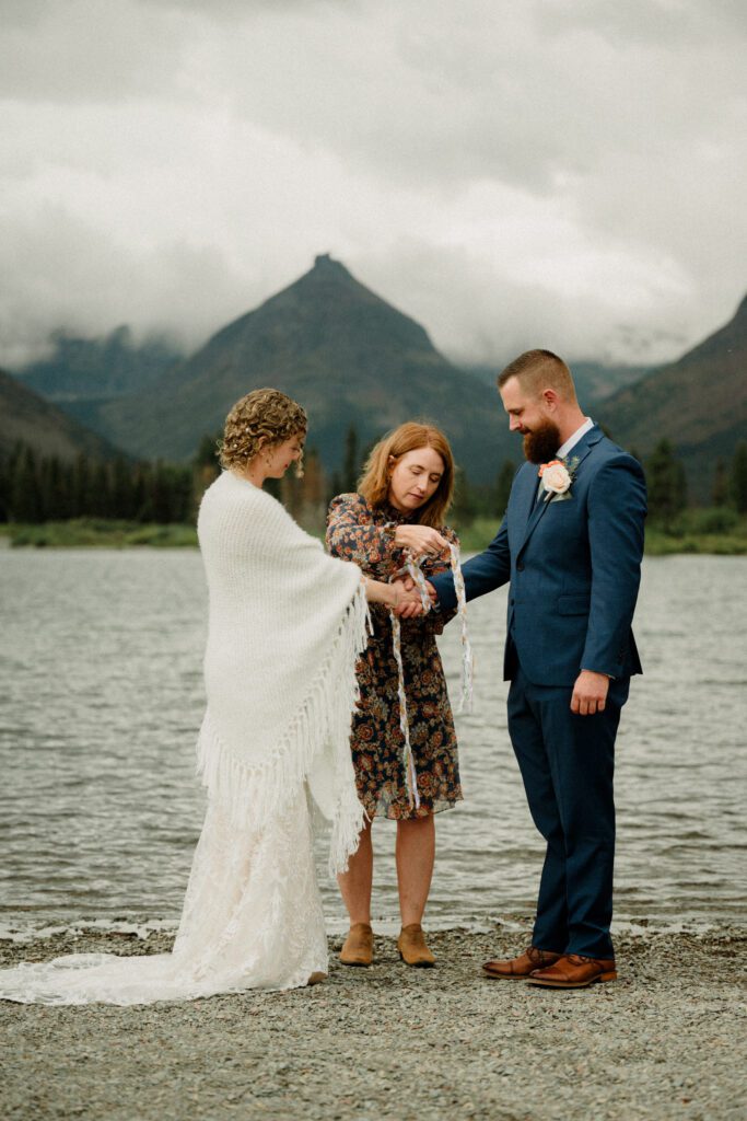 You know it's an adventure wedding in Glacier National Park when you see bears, stumble across mountain sheep and get married! The bride said this about her wedding day, "we literally did EVERYTHING!" 

A Two Medicine wedding ceremony and then a drive up the Going to the Sun Road made this day an epic adventure!