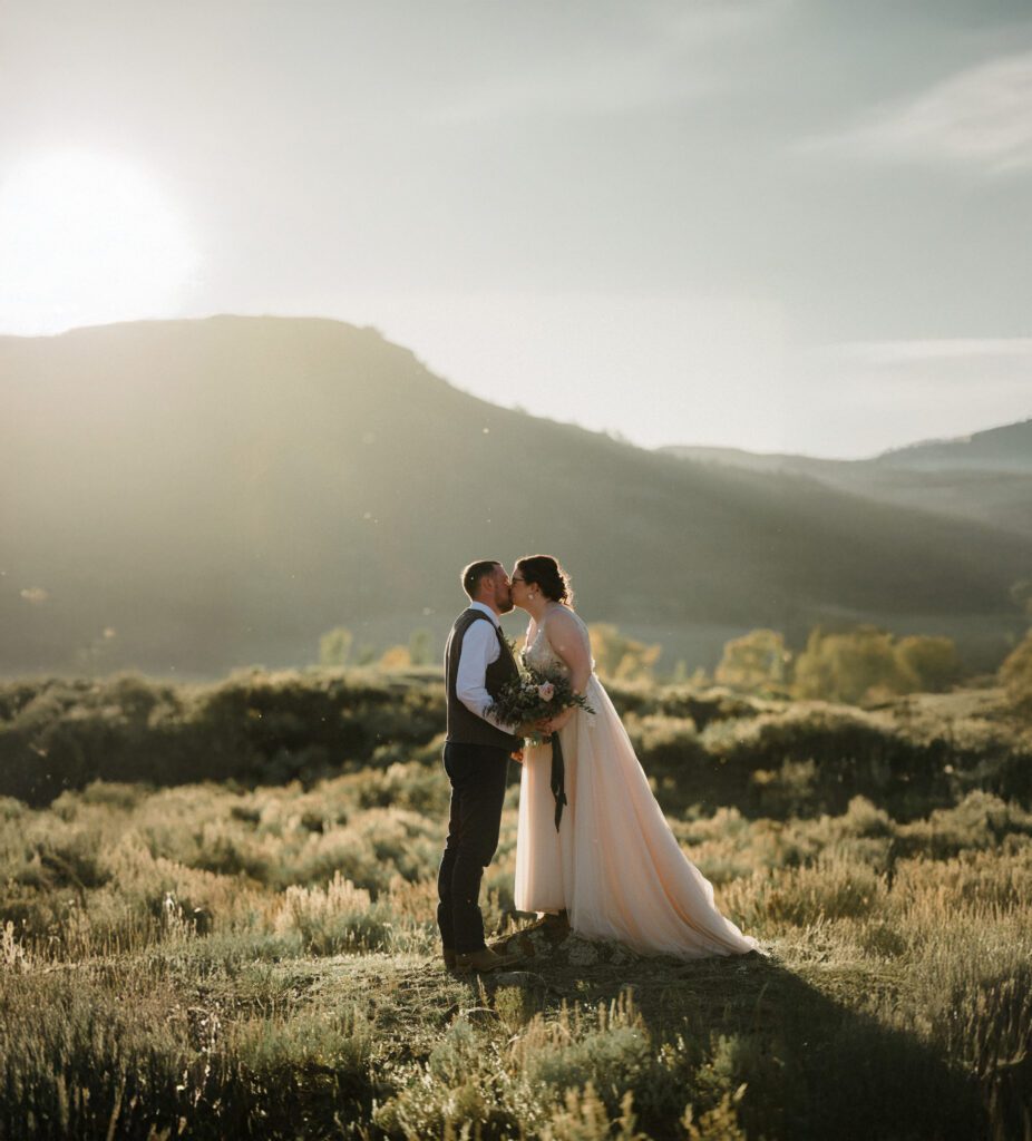 A stunning Yellowstone National Park elopement with intimate moments, breathtaking views and of course the perfect wedding guests- BUFFALO!

Gorgeous wedding photos at sunset in Yellowstone National Park.