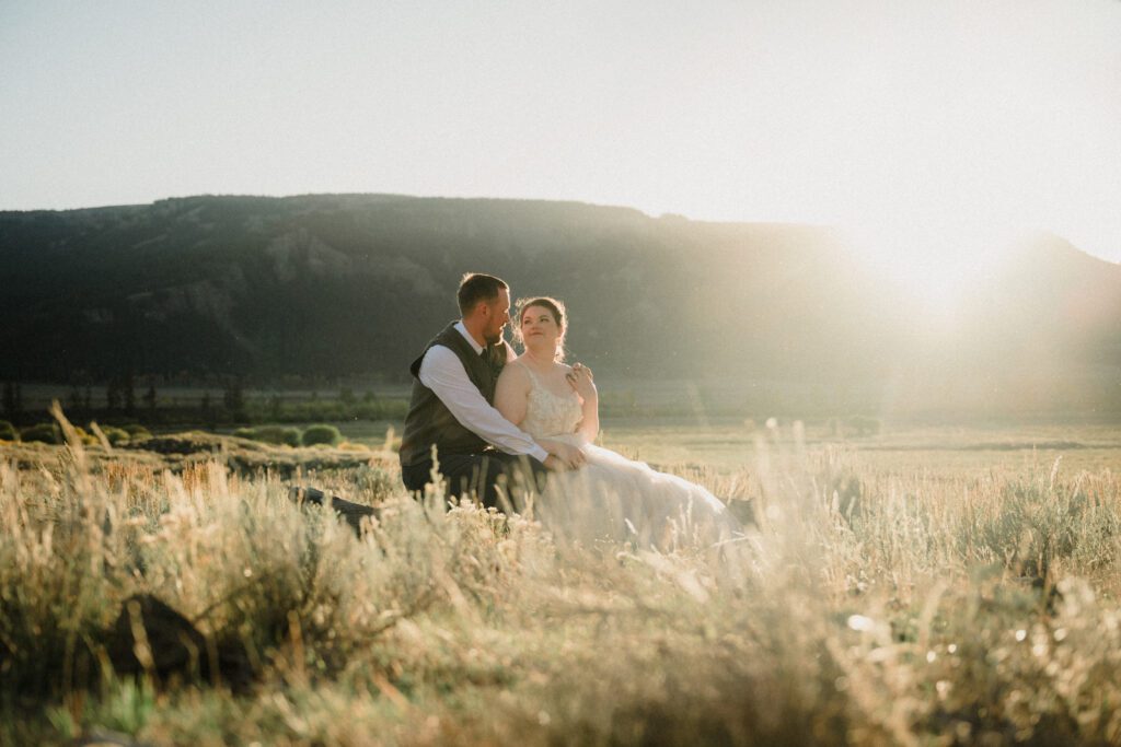 A stunning Yellowstone National Park elopement with intimate moments, breathtaking views and of course the perfect wedding guests- BUFFALO!

Gorgeous wedding photos at sunset in Yellowstone National Park.