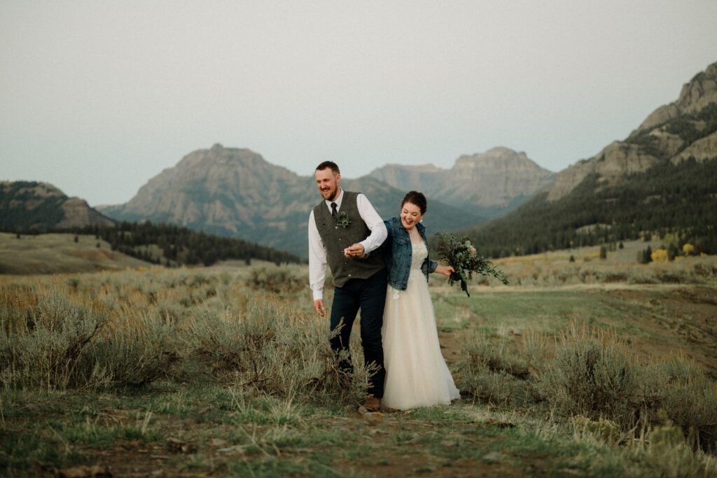 A stunning Yellowstone National Park elopement with intimate moments, breathtaking views and of course the perfect wedding guests- BUFFALO!

Gorgeous wedding photos at sunset in Yellowstone National Park.