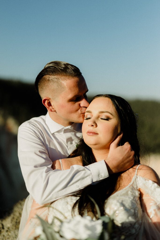 Plan your dream elopement in Yellowstone! Breathtaking views at Artist Point and stunning memories captured by our photographers await you! 