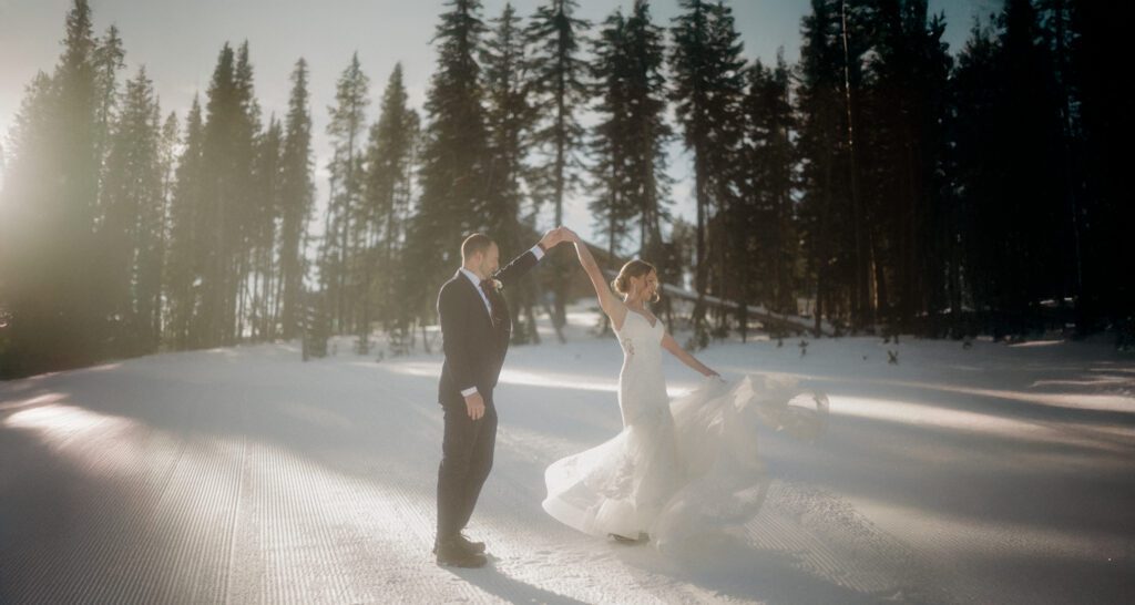 An adventurous winter elopement in Montana features frozen waterfalls, ski lifts, reindeer, and stunning star photos. Explore their epic day! Get more info on Where to stay in Big Sky Resort!