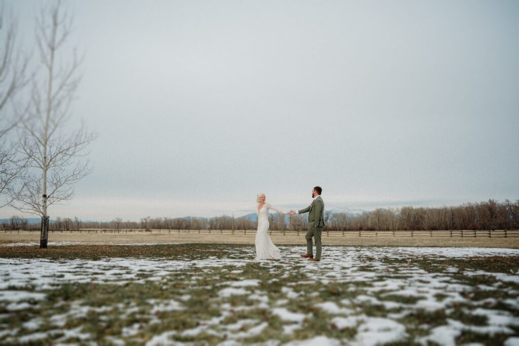 It's magic for this winter wedding in Bozeman at Firelight Farm. Cozy vibes, a champagne tower, and western charm!