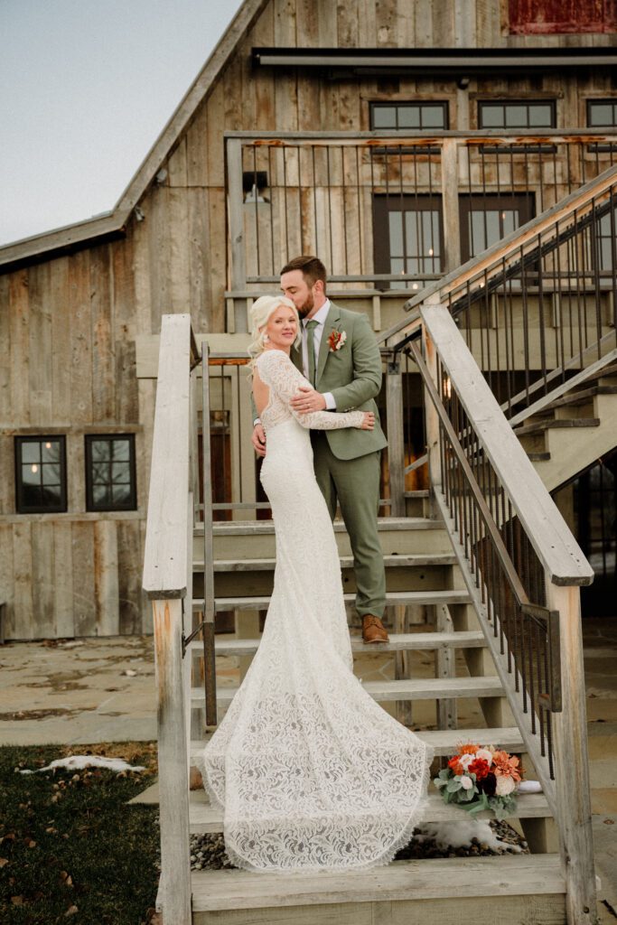 It's magic for this winter wedding in Bozeman at Firelight Farm. Cozy vibes, a champagne tower, and western charm!