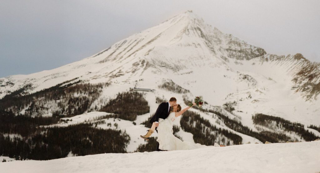 An adventurous winter elopement in Montana features frozen waterfalls, ski lifts, reindeer, and stunning star photos. Explore their epic day! Get more info on Where to stay in Big Sky Resort!