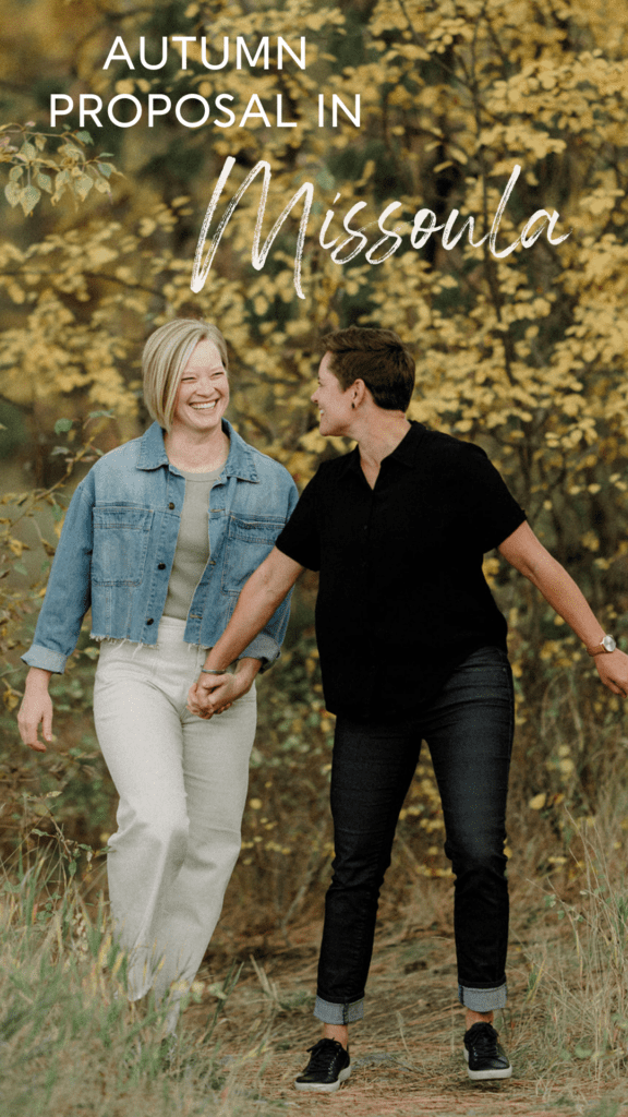 Lesbian Proposal in Missoula: Maclay Flat in Autumn. Photo of two women holding hands and walking through the trees,