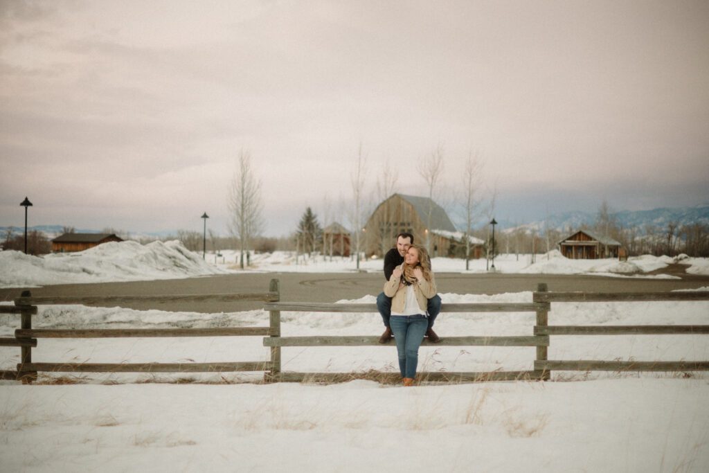 Experience the magic of a winter Bozeman Montana engagement with epic mountains, major Western vibes, and champagne pops.