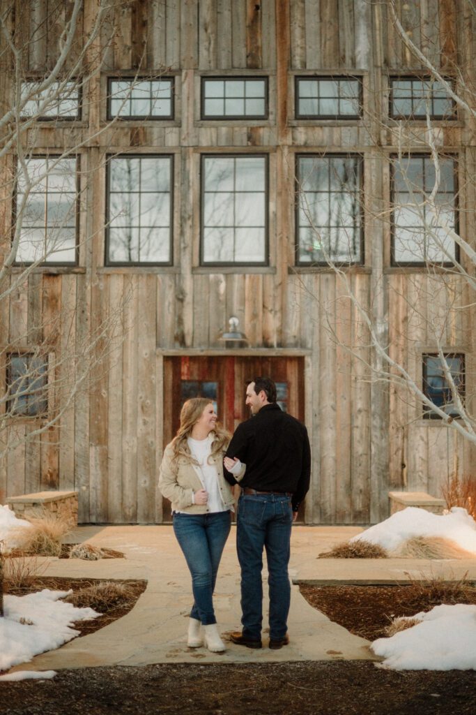 Experience the magic of a winter Bozeman Montana engagement with epic mountains, major Western vibes, and champagne pops.