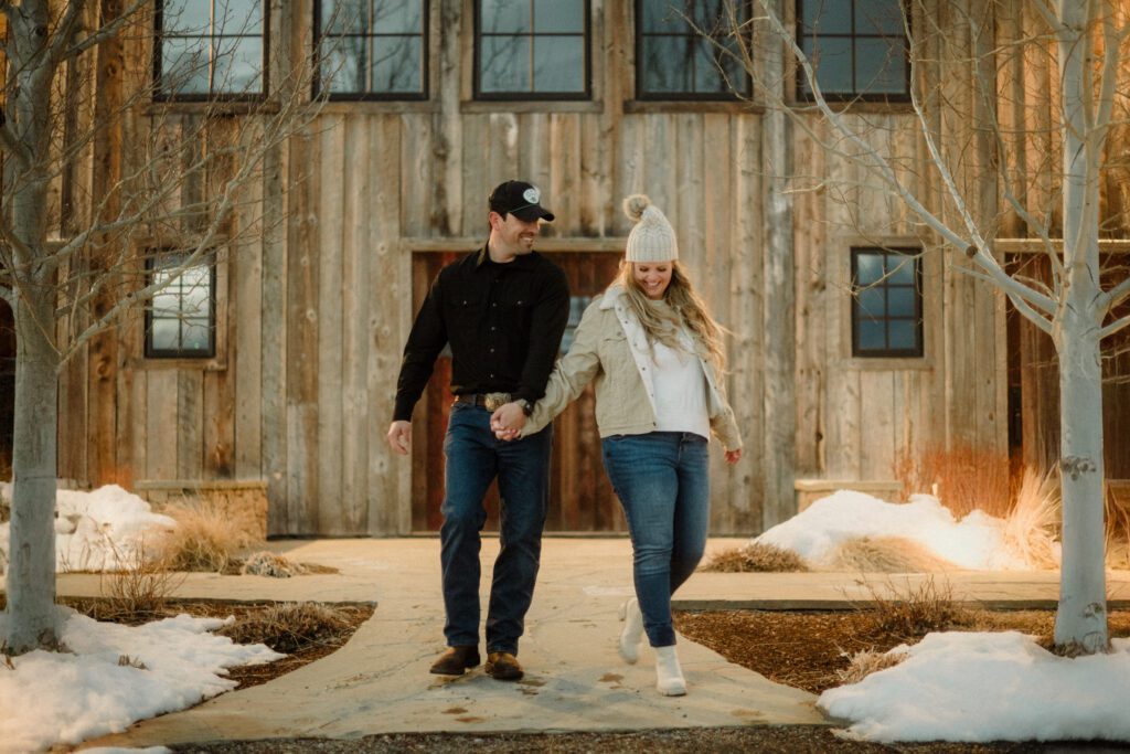 Experience the magic of a winter Bozeman Montana engagement with epic mountains, major Western vibes, and champagne pops.