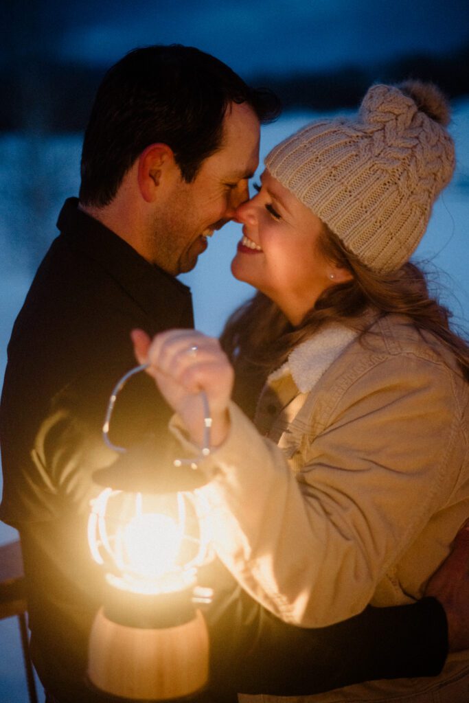 Experience the magic of a winter Bozeman Montana engagement with epic mountains, major Western vibes, and champagne pops.