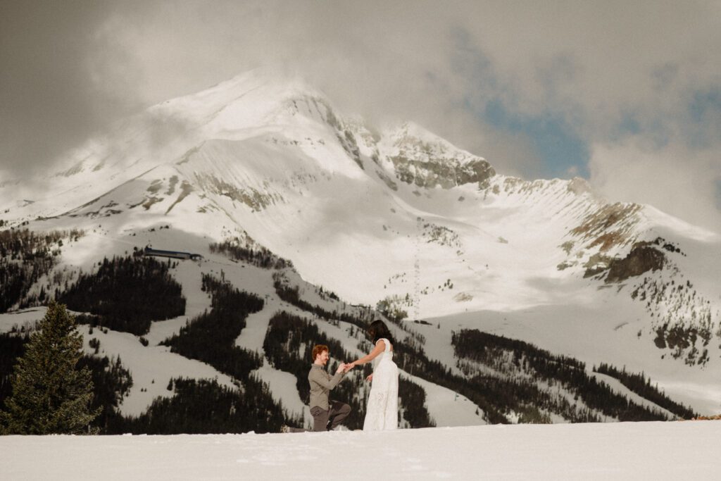 The BEST Big Sky Resort engagement! This dreamy mountaintop proposal in Montana brings the views, the snow, and all the swoon-worthy moments!