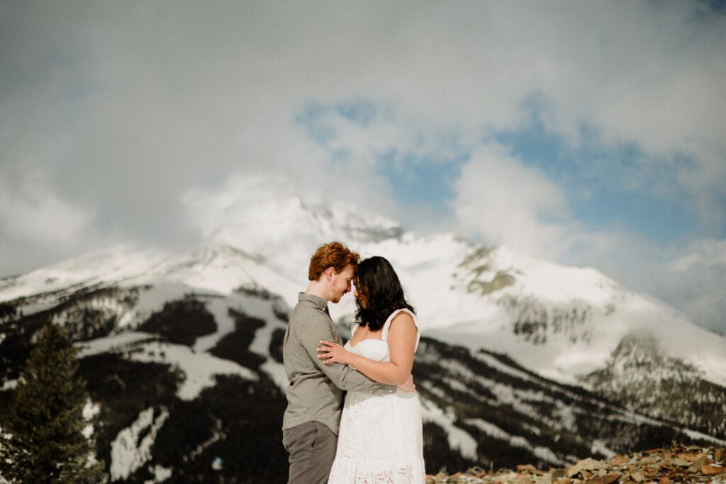 The BEST Big Sky Resort engagement! This dreamy mountaintop proposal in Montana brings the views, the snow, and all the swoon-worthy moments!