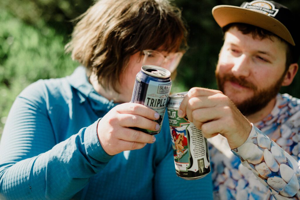 Couple laughing during engagement photos in Bozeman at Hyalite Canyon