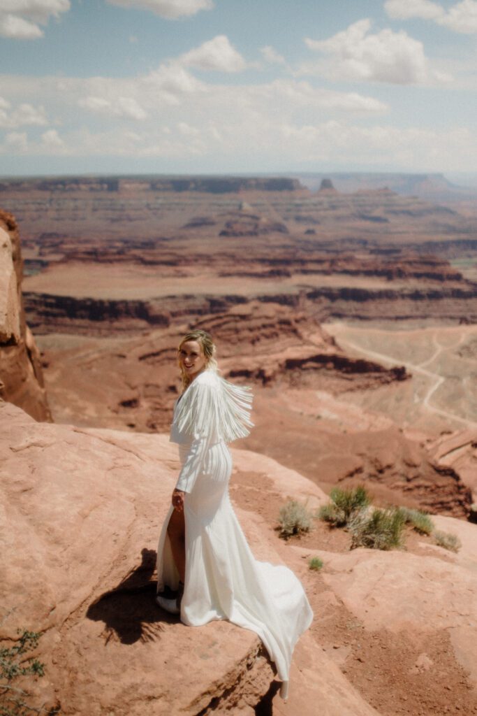 moab elopement, dirt bike wedding, desert elopement dirt bike photo, adventure elopement moab images, moab elopement photographer, ceremony at dead horse point state park