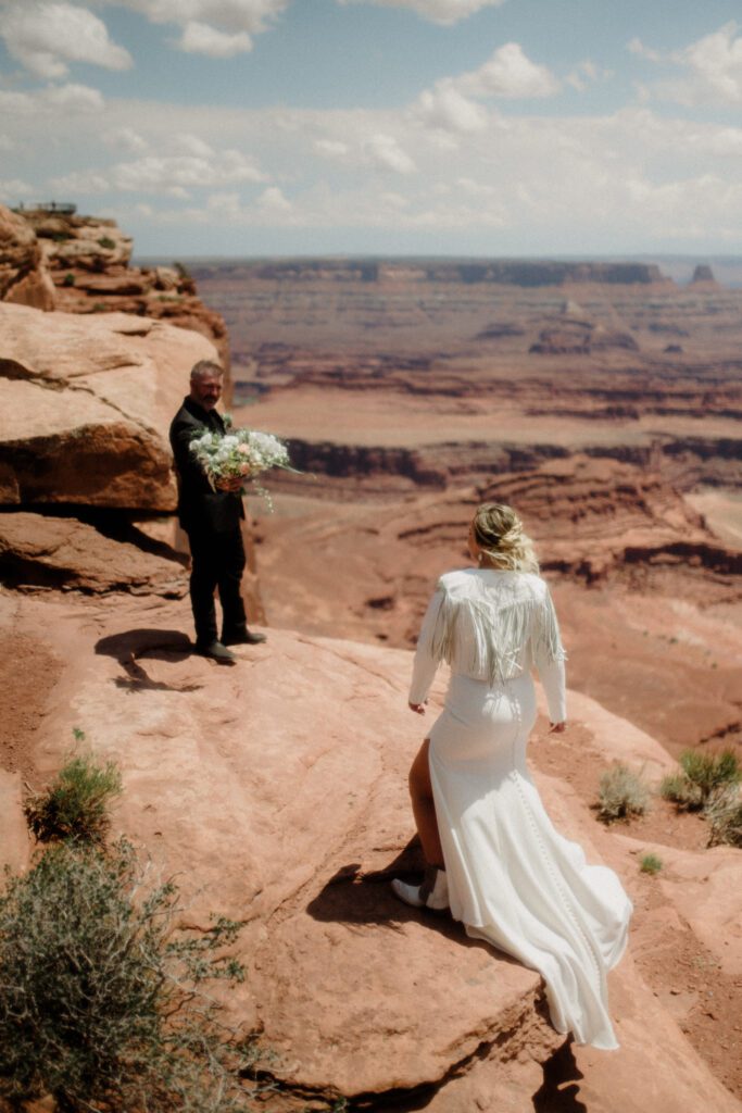 moab elopement, dirt bike wedding, desert elopement dirt bike photo, adventure elopement moab images, moab elopement photographer, ceremony at dead horse point state park