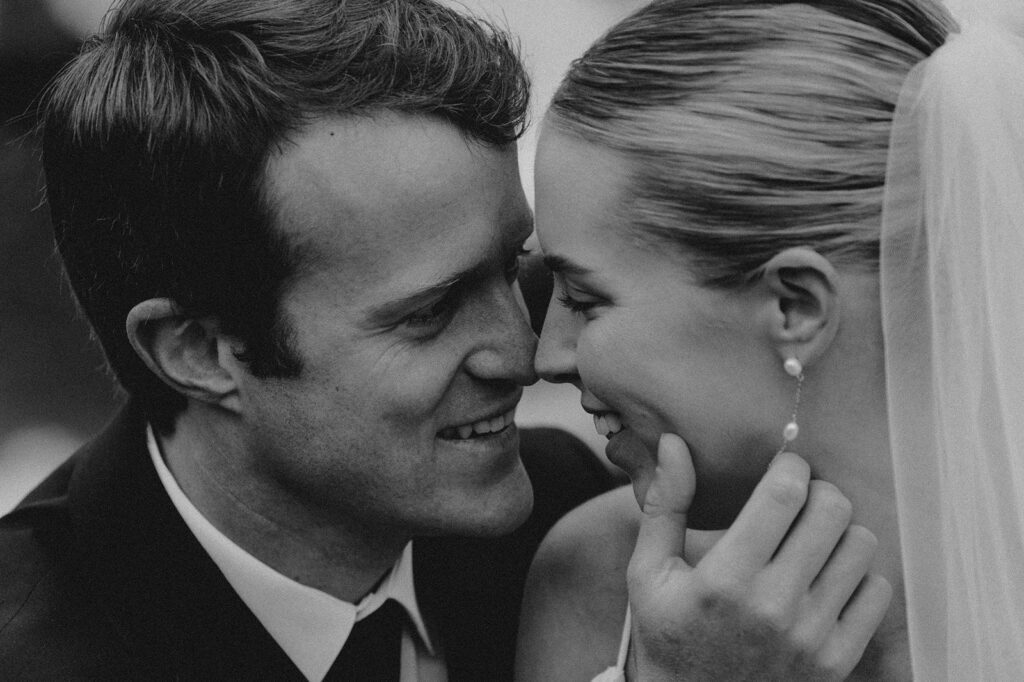 This rain filled National Park wedding in Glacier what dreams are made of! Includes tunnel photos, Going-to-the-Sun road, and Many Glacier hotel ceremony. 