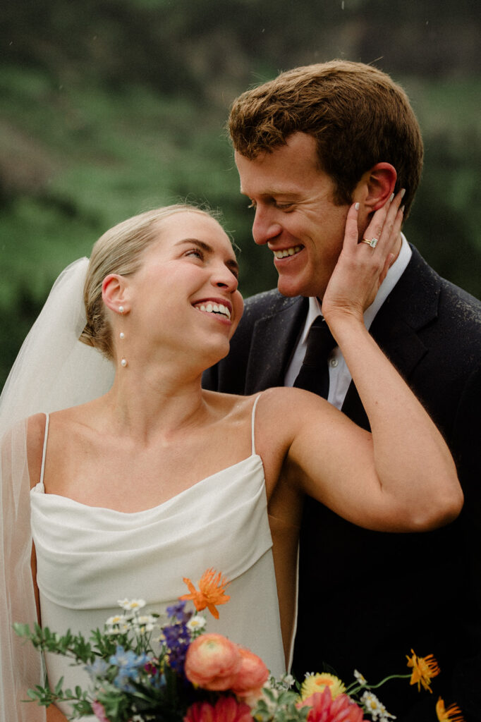 This rain filled National Park wedding in Glacier what dreams are made of! Includes tunnel photos, Going-to-the-Sun road, and Many Glacier hotel ceremony. 