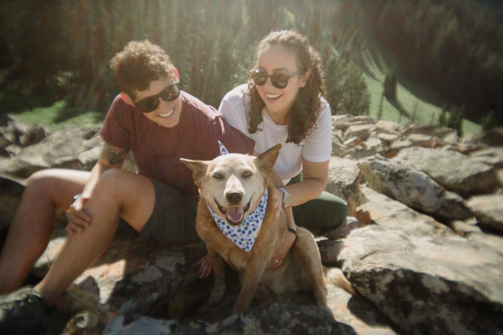K&S's Montana hiking engagement session in Big Sky —wildflowers, adventure vibes, and pup cameos included!