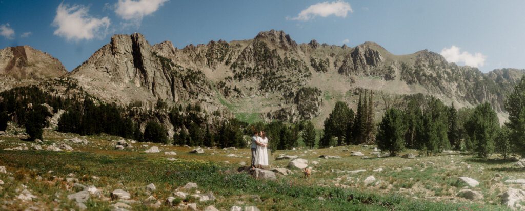 K&S's Montana hiking engagement session in Big Sky —wildflowers, adventure vibes, and pup cameos included!