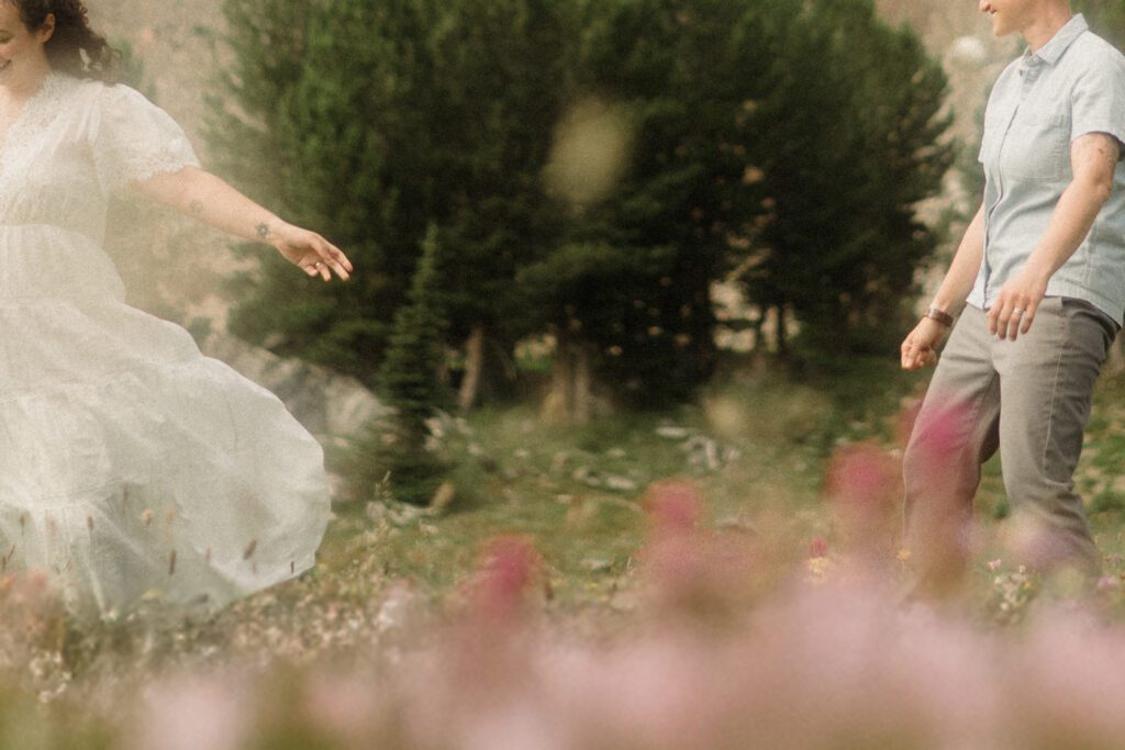 K&S's Montana hiking engagement session in Big Sky —wildflowers, adventure vibes, and pup cameos included!