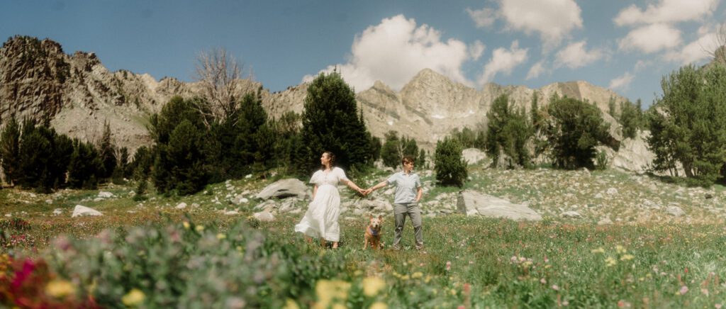 K&S's Montana hiking engagement session in Big Sky —wildflowers, adventure vibes, and pup cameos included!