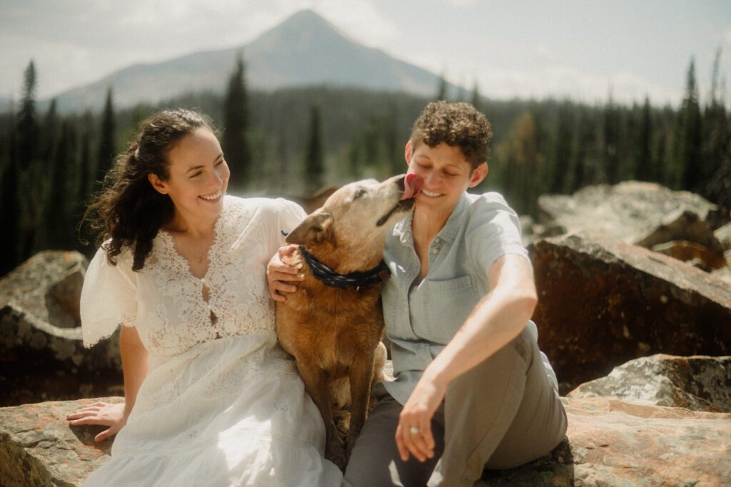 K&S's Montana hiking engagement session in Big Sky —wildflowers, adventure vibes, and pup cameos included!