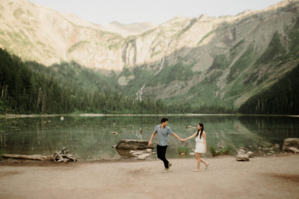 Engagement photos in Glacier National Park with stunning light and scenery