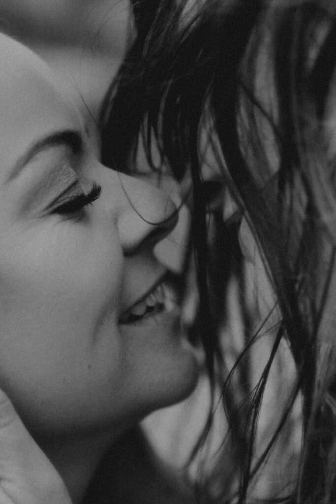 Northern Ireland elopement with epic locations like Kinbane Castle, Ballintoy Harbor and Giant's Causeway! LGBTQ+ wedding photographer takes Debbie & Kirstie on an epic adventure in Northern Ireland!