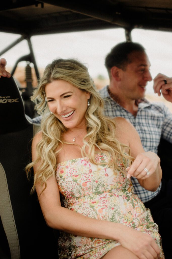 Adventure Session in Moab with bride and groom exploring in an ATV. ATV wedding photos.