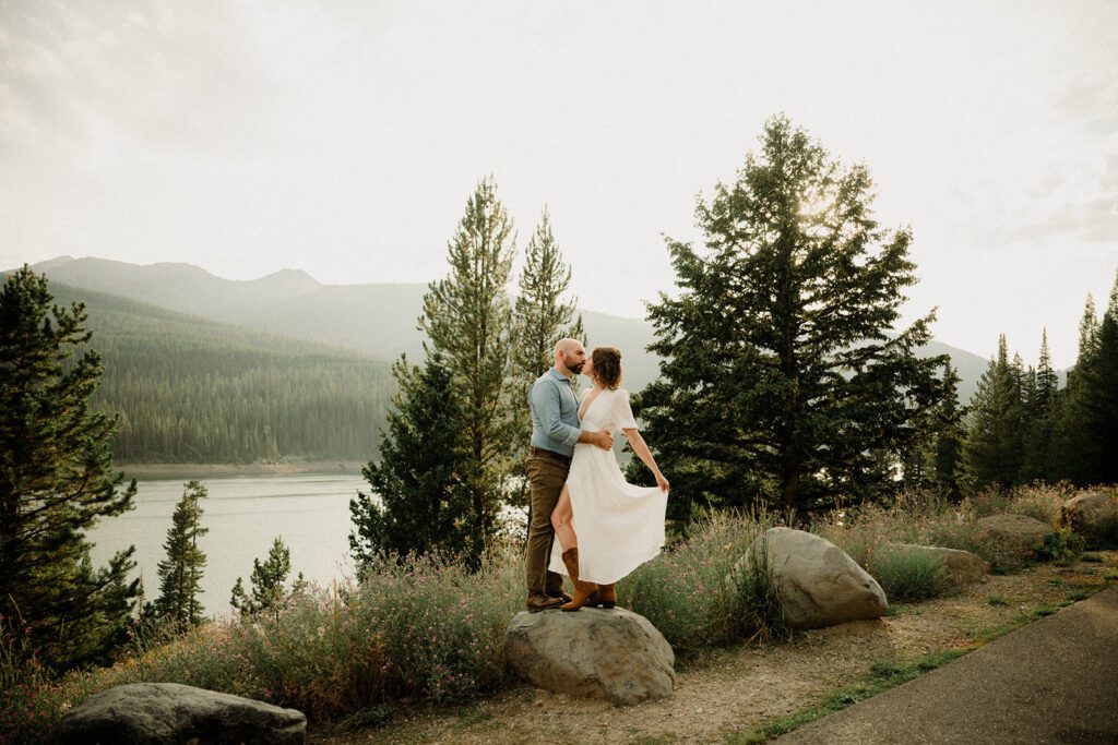 Hyalite Canyon Engagement Session with epic mountain views, lake magic, dog-friendly trails, and a hilarious Halloween ghost twist. Fun, real,  SO Bozeman. 