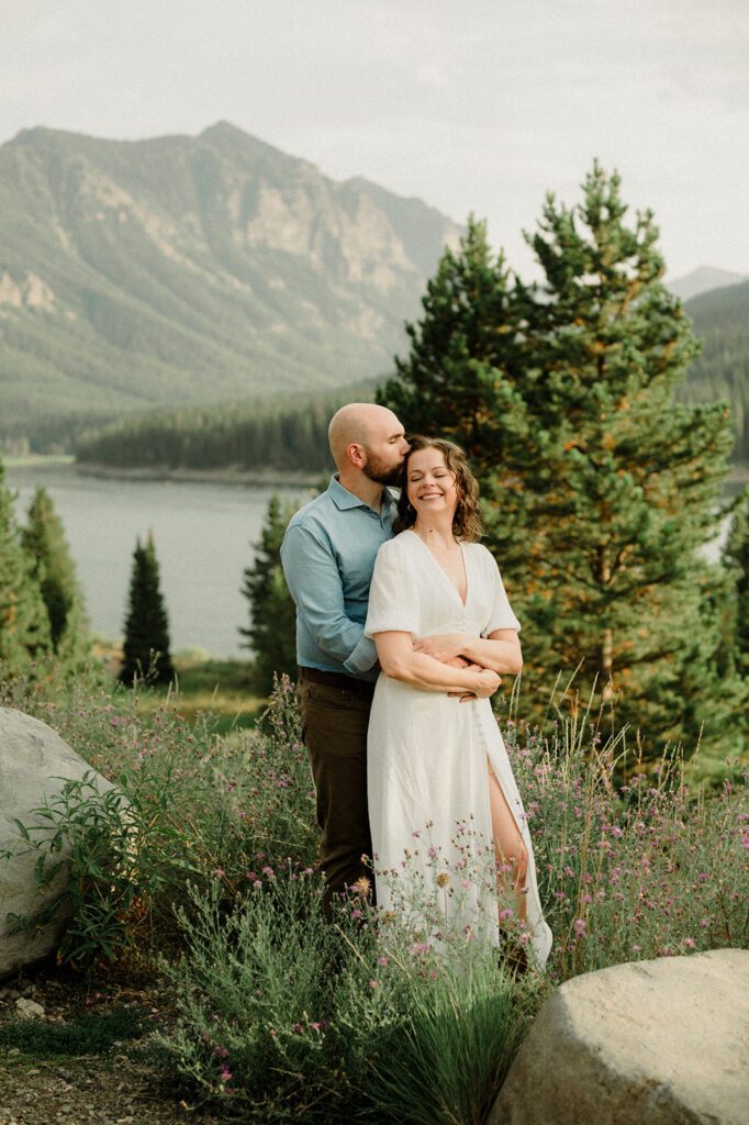 Hyalite Canyon Engagement Session with epic mountain views, lake magic, dog-friendly trails, and a hilarious Halloween ghost twist. Fun, real,  SO Bozeman. 
