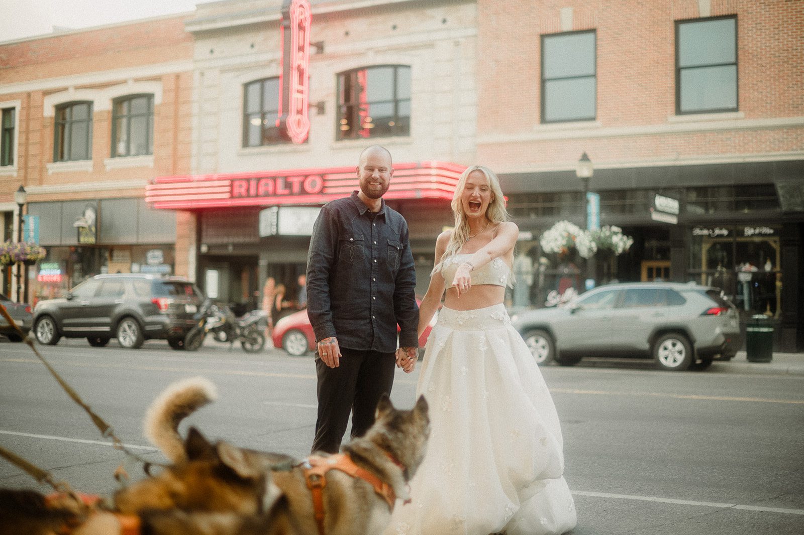 Colorful modern wedding in Bozeman at Firelight Farm featuring vibrant fashion, Filipino desserts, sunset portraits, and a disco after party.