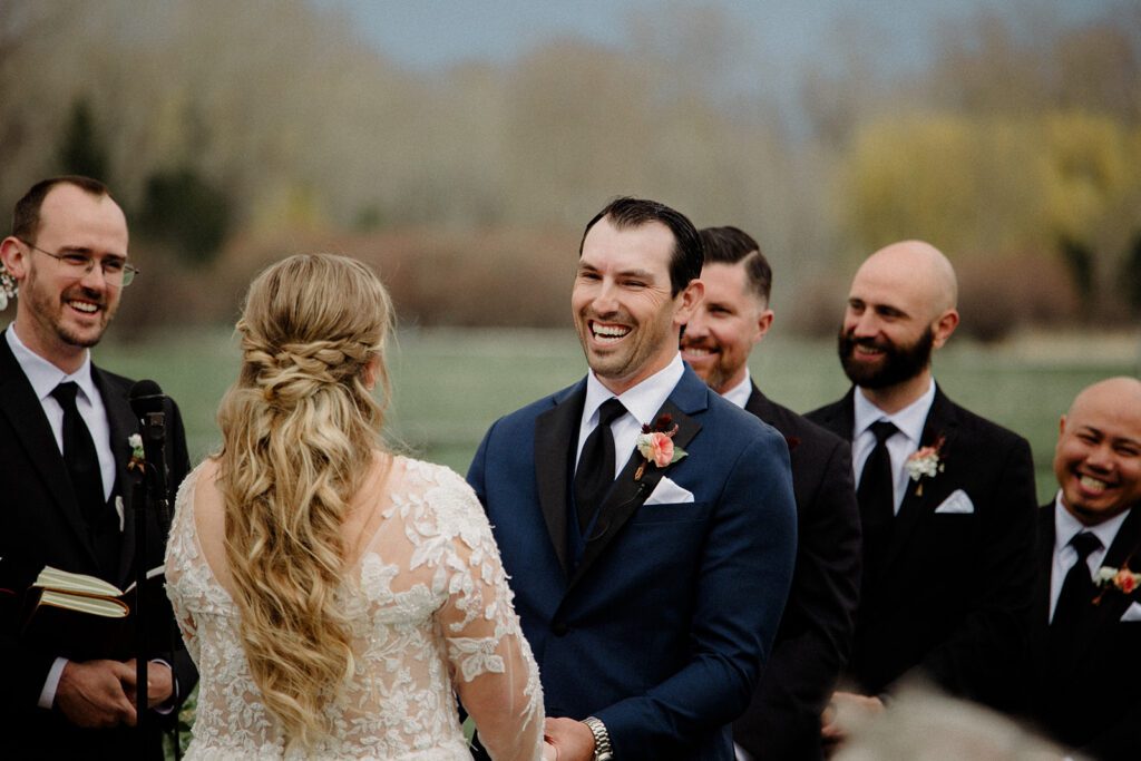 See this Bozeman wedding at Firelight Farm featuring heartfelt moments, joyful laughter, and a couple whose love shines in every photo.