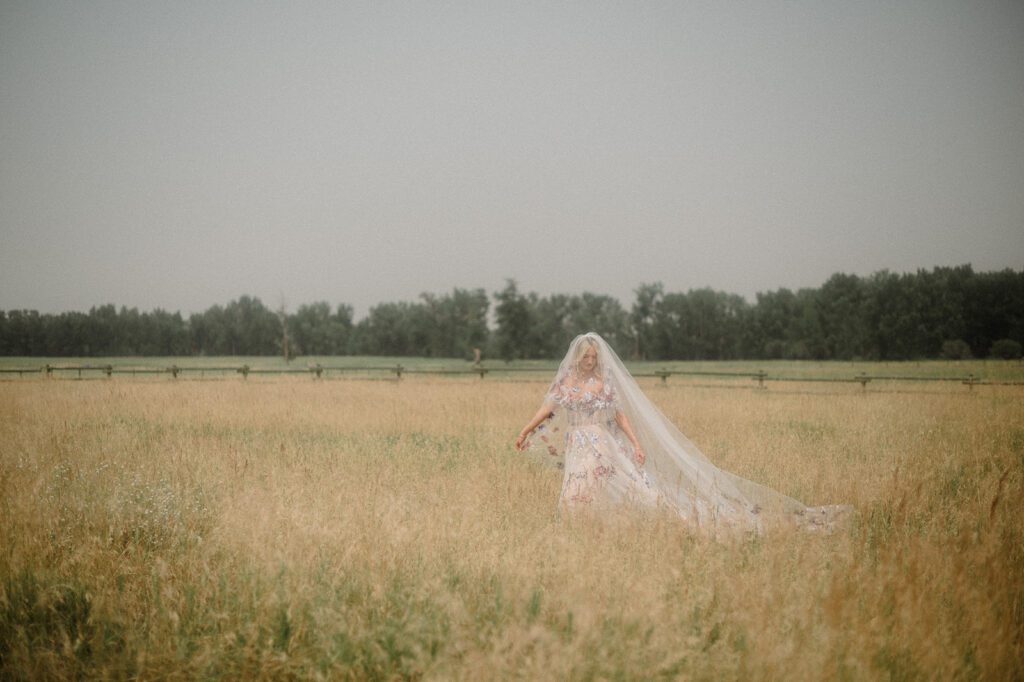 Colorful modern wedding in Bozeman at Firelight Farm featuring vibrant fashion, Filipino desserts, sunset portraits, and a disco after party.