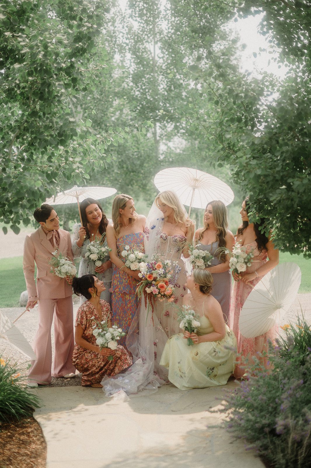 Colorful modern wedding in Bozeman at Firelight Farm featuring vibrant fashion, Filipino desserts, sunset portraits, and a disco after party.