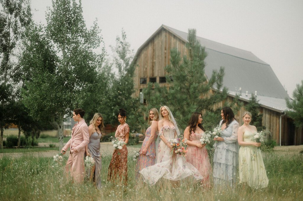 Colorful modern wedding in Bozeman at Firelight Farm featuring vibrant fashion, Filipino desserts, sunset portraits, and a disco after party.
