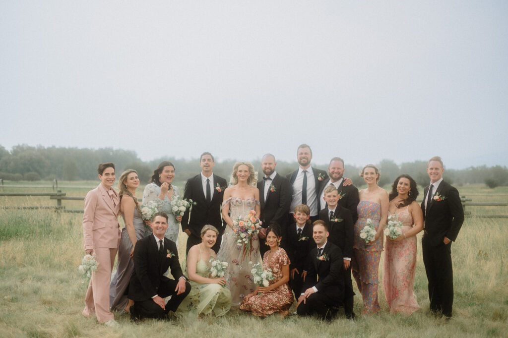 Colorful modern wedding in Bozeman at Firelight Farm featuring vibrant fashion, Filipino desserts, sunset portraits, and a disco after party.