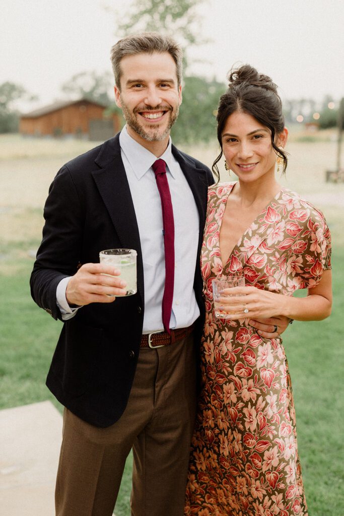 Colorful modern wedding in Bozeman at Firelight Farm featuring vibrant fashion, Filipino desserts, sunset portraits, and a disco after party.