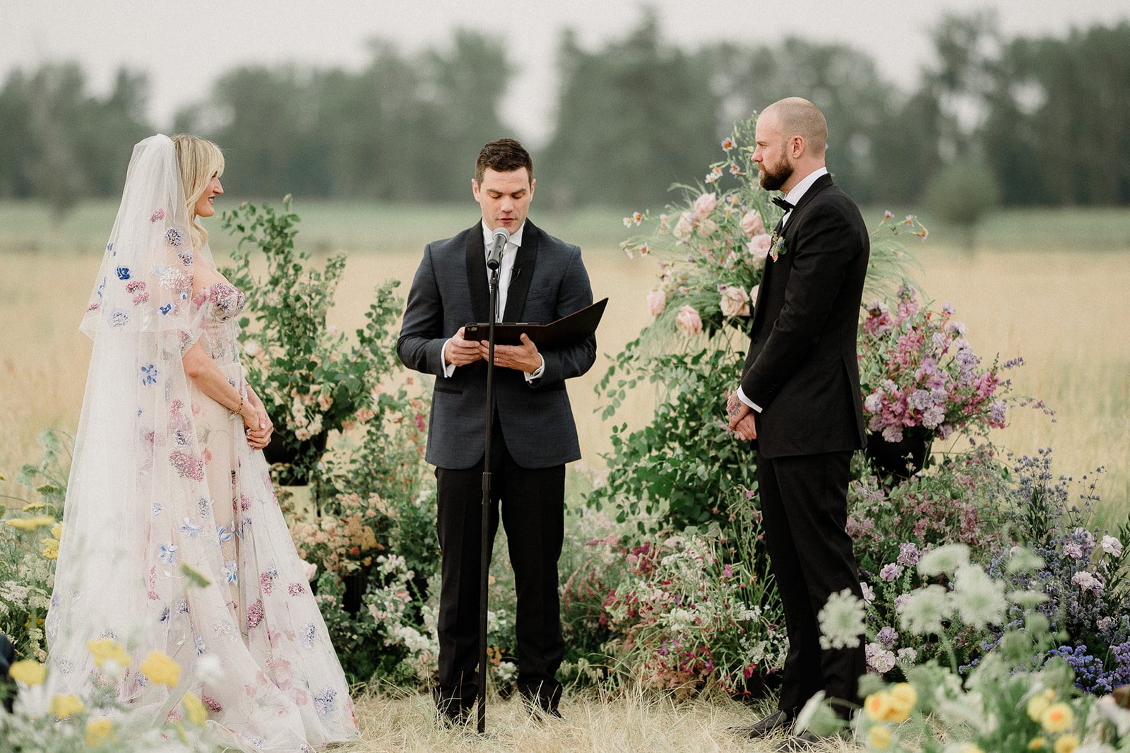 Colorful modern wedding in Bozeman at Firelight Farm featuring vibrant fashion, Filipino desserts, sunset portraits, and a disco after party.