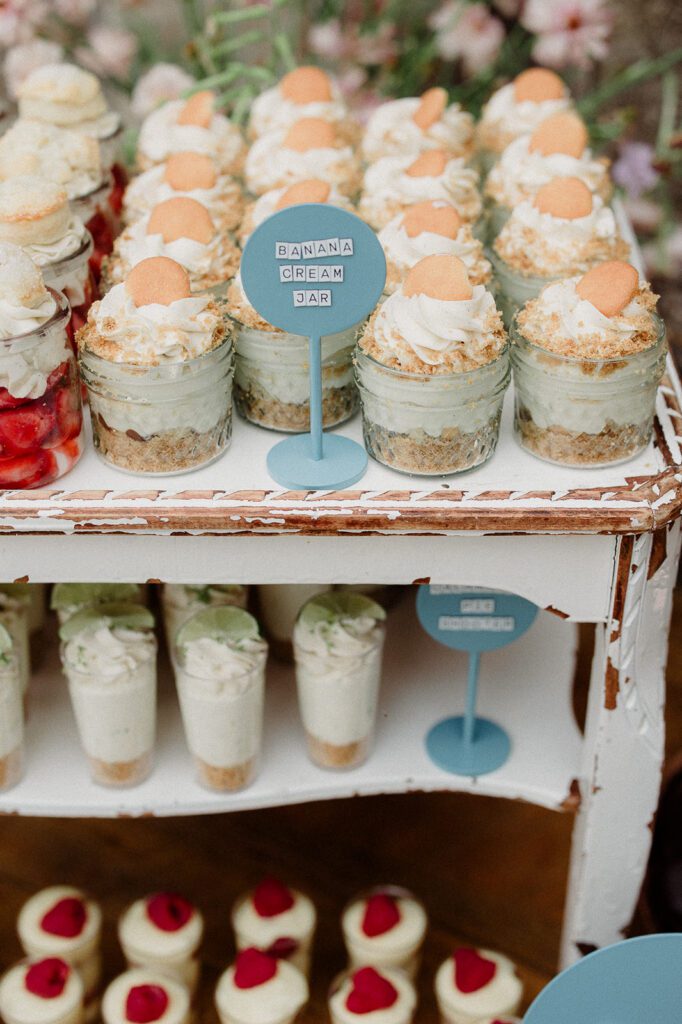 Colorful modern wedding in Bozeman at Firelight Farm featuring vibrant fashion, Filipino desserts, sunset portraits, and a disco after party.