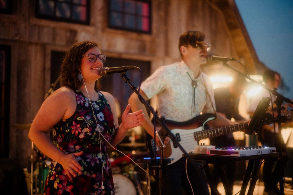 Colorful modern wedding in Bozeman at Firelight Farm featuring vibrant fashion, Filipino desserts, sunset portraits, and a disco after party.