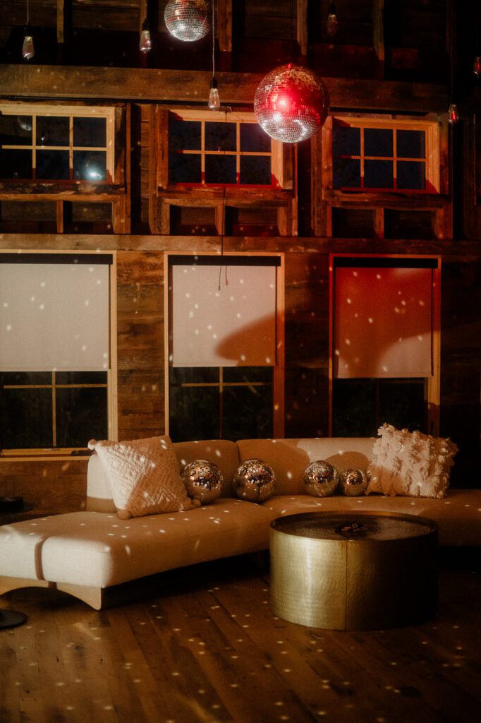 Colorful modern wedding in Bozeman at Firelight Farm featuring vibrant fashion, Filipino desserts, sunset portraits, and a disco after party.