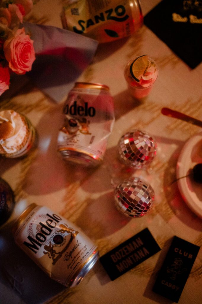 Colorful modern wedding in Bozeman at Firelight Farm featuring vibrant fashion, Filipino desserts, sunset portraits, and a disco after party.