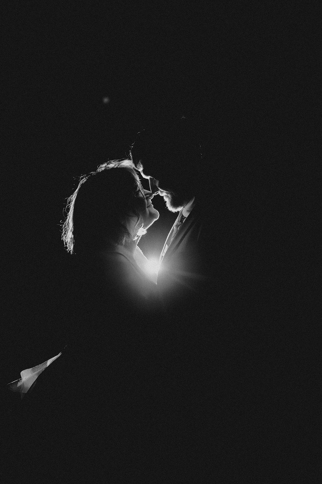 A fun non-traditional wedding in Bozeman with flower baskets, pizza, a “gaggle” wedding party, and sunset photos. See how this couple rewrote the rules.